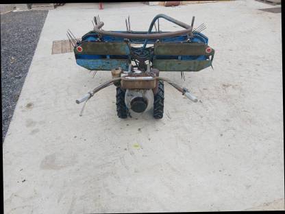 Bild 4:Heuwiesel mit Motormäher