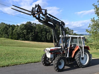 STEYR 8065 a mit Frontlader Hydrac FL EK 1200P