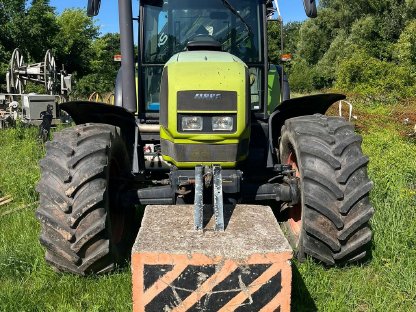 Claas Ares 836 mit Ladekran und Tandem-Anhänger 25 t Moog MZA21