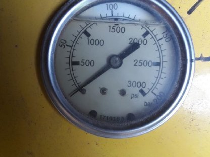 Bild 9:Rundballenpresse mit Raffer, New Holland BR 750