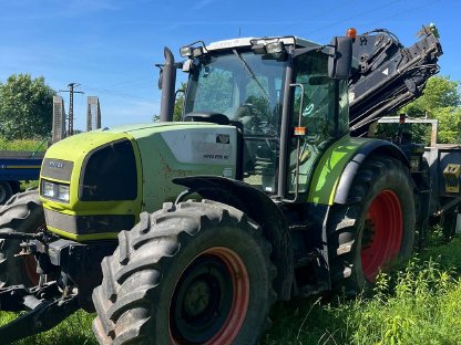 Bild 4:Claas Ares 836 mit Ladekran und Tandem-Anhänger 25 t Moog MZA21