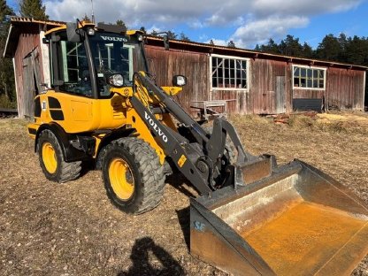 Volvo L20H Radlader mit Schaufel und Gabeln