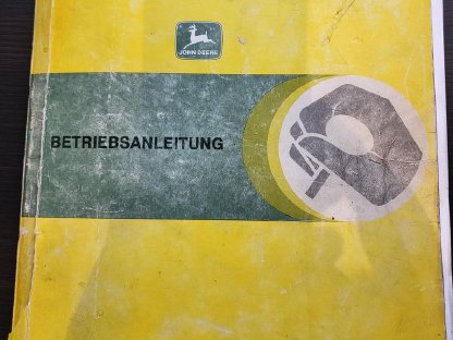 Bild 5:Rundballenpresse John Deere 570