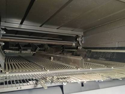 Bild 5:Claas Tucano 560 Montana mit klappbarem Cressoni Sojaflex 66