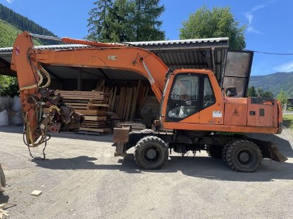 Bild 3:Daewoo Bagger mit Prozessor-Kopf Woody 60