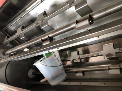 Bild 4:Kübelwaschanlage für Kälbereimer