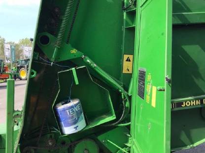 Bild 6:Rundballenpresse John Deere 550