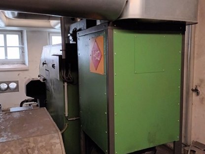 Bild 5:Hackschnitzelheizung HDG 150 kW inkl. Bunkeraustragung