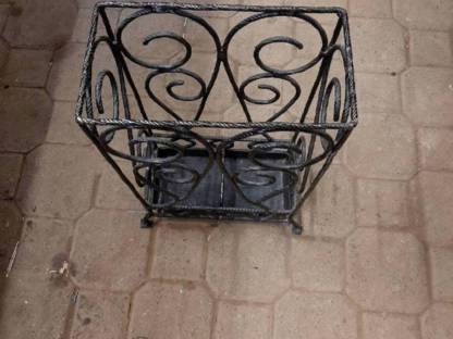 Bild 2:Schmiedeeiserner Schirmständer