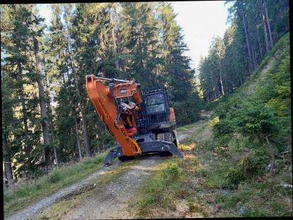 Doosan DX210W mit Woody H61
