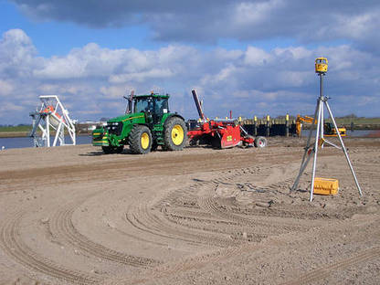 Bild 2:Planieren von Acker und Grünland