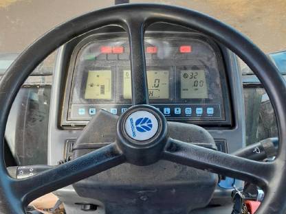 Bild 4:New Holland TS 110, Hauer Frontlader