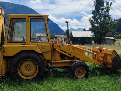 Bild 2:Ford 550 Radlader mit Heckbagger