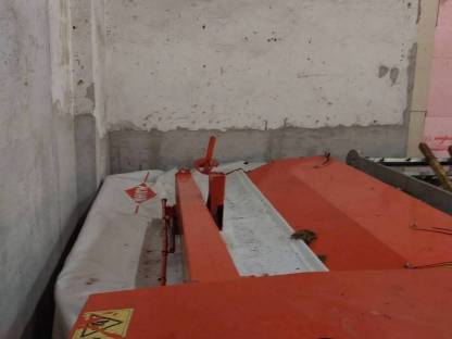 Bild 2:Kuhn Heckmähwerk mit Aufbereiter Liftcontrol
