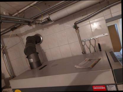 Bild 4:Sehr gut gepflegte 15 kW Heizung von Bösch für Stückholz