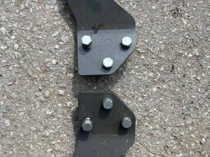 Halter für Mähwerksfedern