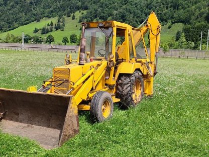 Ford 550 Radlader mit Heckbagger