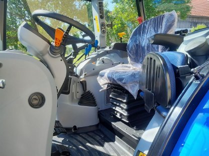 Bild 2:New Holland T5.90 NEU, Tieflader, Grubber