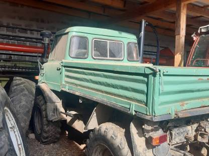 Bild 2:Unimog 406 mit Heckhubwerk