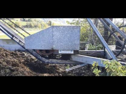 Bild 3:Höhenförderer für Schauerentmistung