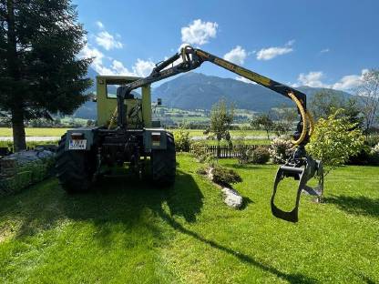 Bild 6:MB Trac 700 mit Forstkran