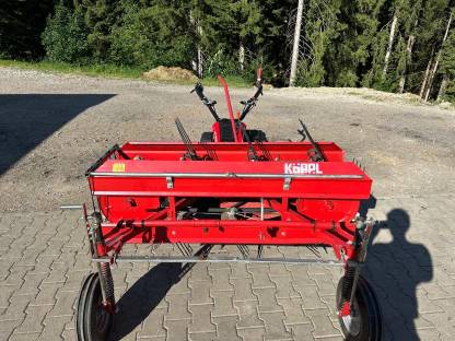 Bild 3:Bandrechen für Köppl Einachsmäher