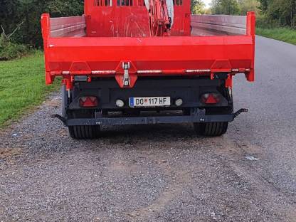 Bild 4:Tandemkipper mit Kran Fliegl