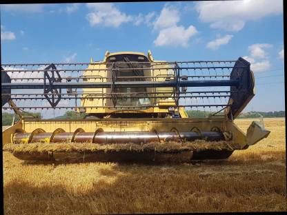 Bild 7:Kombájn New Holland TX66