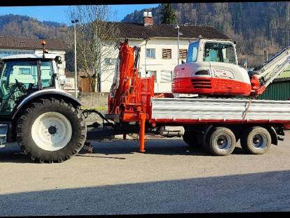 Bild 9:Tandemkipper mit Kran Fliegl