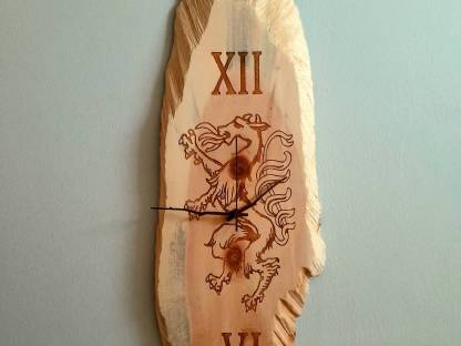 Zirben-Holz Wanduhr mit Steirischen Panther Gelasert.