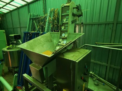 Bild 5:Verschließmaschine für Schnappdeckel, Deckelsortierer