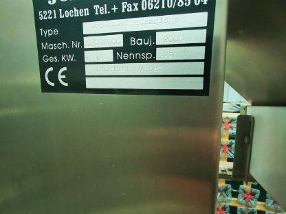 Bild 6:Verschließmaschine für Schnappdeckel, Deckelsortierer