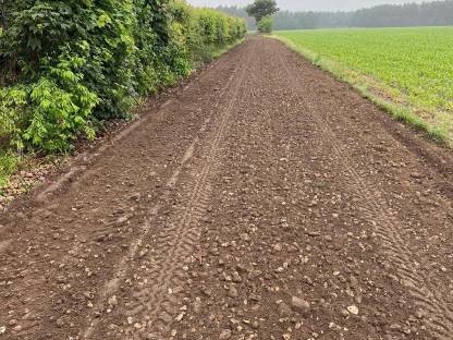 Bild 2:Forst-Alm-Wegsanierungen, Rekultivierung, Böschungspflege.