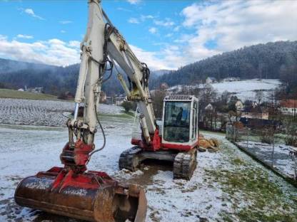 Hydraulischer Böschungslöffel mit hydraulischem Schnellwechsler